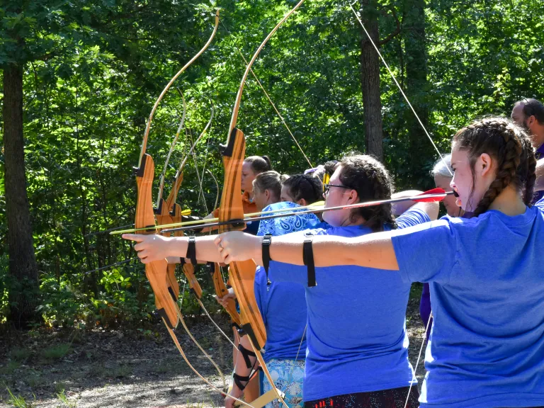People shooting arrows
