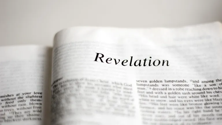 The book of Revelation is in a class of its own. A Bible opened to first page of Revelation.