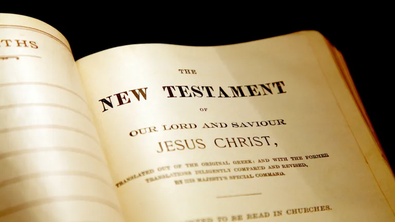 A Bible opened to the beginning of the New Testament.