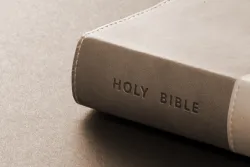 A Bible on a table.
