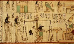 Anubis, el dios con cabeza de chacal pesa el corazón del muerto en las escalas de la justicia y mira a Osiris para la sentencia – vida eterna en el paraíso o ser arrojado en el fuego, agua hirviendo o a un monstruo para ser destrozado.